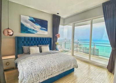 Modern bedroom with ocean view and luxurious interior design