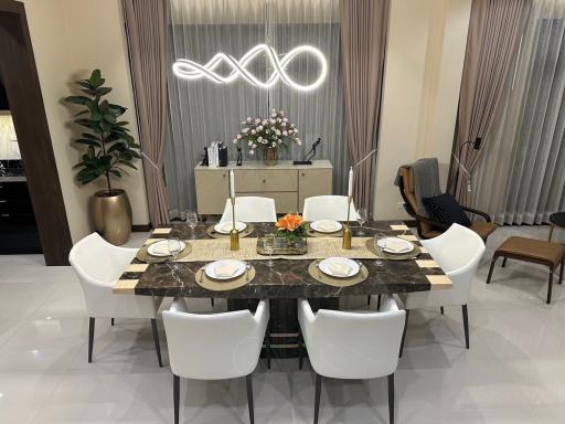 Elegant dining room with modern furniture and stylish lighting