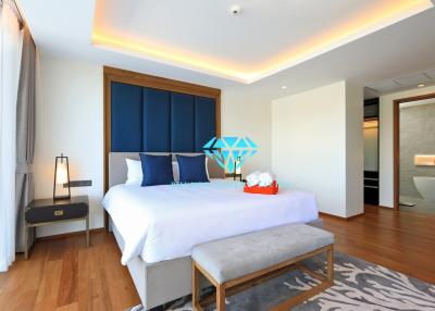 Modern bedroom with stylish interior design and en-suite bathroom