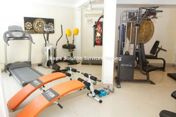 Home gym with various exercise equipment