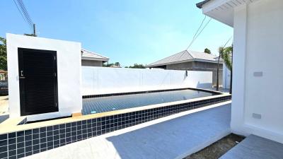 Contemporary house exterior with private swimming pool