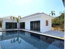 Modern white house with a swimming pool