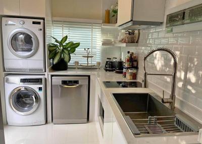 Modern kitchen with stainless steel appliances