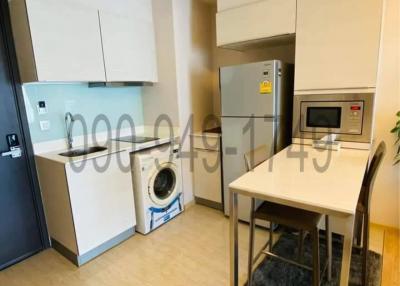 Modern kitchen with dining area in an apartment