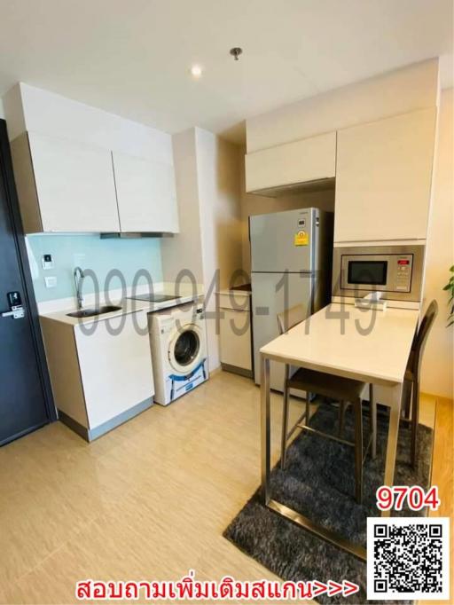 Modern kitchen with dining area in an apartment