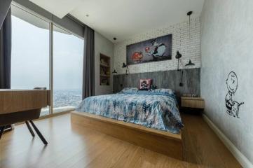 Modern bedroom with large window and city view