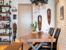 Modern dining area with a wooden table and chic decor