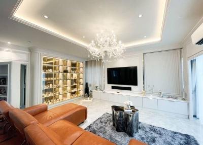 Elegant living room with chandelier and modern decor