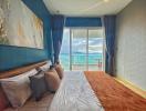 Cozy bedroom with a sea view and balcony access