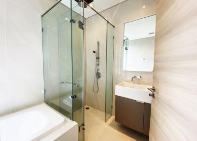 Modern bathroom with walk-in shower and vanity