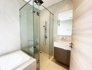 Modern bathroom with walk-in shower and vanity