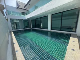 Newly renovated modern, Balinese - style pool villa for sale near to Naiyang Beach Phuket.