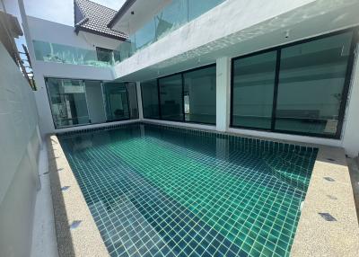 Newly renovated modern, Balinese - style pool villa for sale near to Naiyang Beach Phuket.