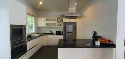 Modern kitchen with stainless steel appliances and island