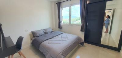 Modern bedroom with a view and natural lighting