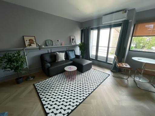 Cozy living room with comfortable seating and natural light