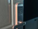 Modern smart lock on front door offering enhanced security