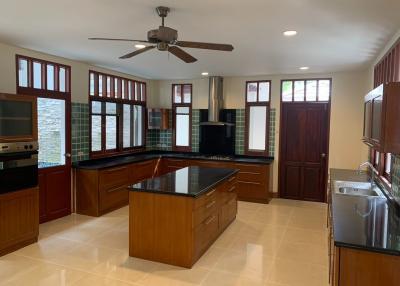 Spacious kitchen with modern appliances and ample natural light