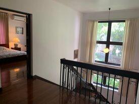 Cozy bedroom with natural light and access to balcony