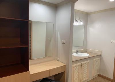 Modern bathroom interior with vanity cabinet and large mirror