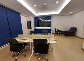 Modern office interior with meeting area and lounge zone