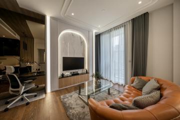 Modern living room with office nook and natural light