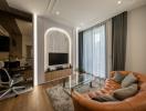 Modern living room with office nook and natural light