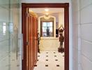 Elegant entrance hall with ornate ceiling and tiled floor