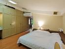 Spacious Bedroom with Large Wardrobe and Air Conditioning