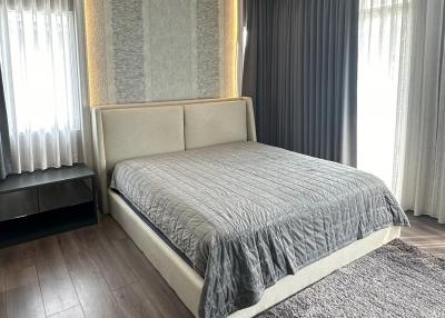 Elegant bedroom with natural light and modern design