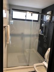 Modern bathroom interior with walk-in shower