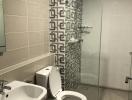 Modern bathroom with patterned wall tiles