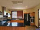 Modern kitchen with ample counter space and stainless steel appliances