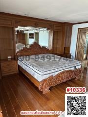 Elegant bedroom with wooden furniture and hardwood floors