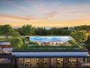 Luxurious rooftop pool with seating area and garden at dusk