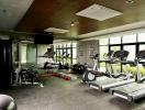 Modern home gym with various exercise equipment