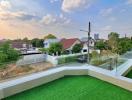 Panoramic view from a rooftop garden at dusk