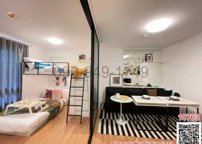 Compact studio apartment with integrated living space
