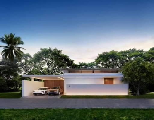 Modern single-story house with garage and lush greenery