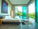 Spacious bedroom with large bed, floor-to-ceiling windows, and pool view
