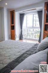 Cozy bedroom with natural light from the window