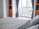 Cozy bedroom with natural light from the window