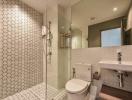 Modern bathroom with walk-in shower and hexagonal tiles