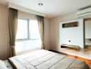 Cozy bedroom with natural light and modern decor