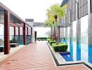 Modern rooftop terrace with pool and lounge area