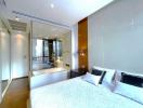 Modern bedroom with en-suite bathroom and city view