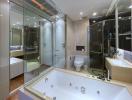 Modern bathroom interior with glass shower cabin, bathtub, and toilet