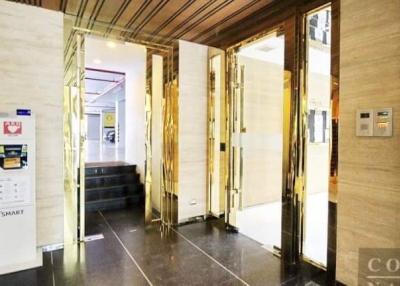 Elegant building entrance with revolving doors