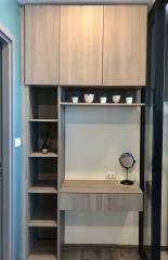 Modern hallway with integrated shelving and decor