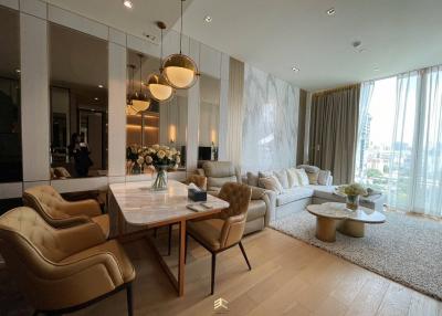 Elegant and spacious living room with modern furniture and large windows